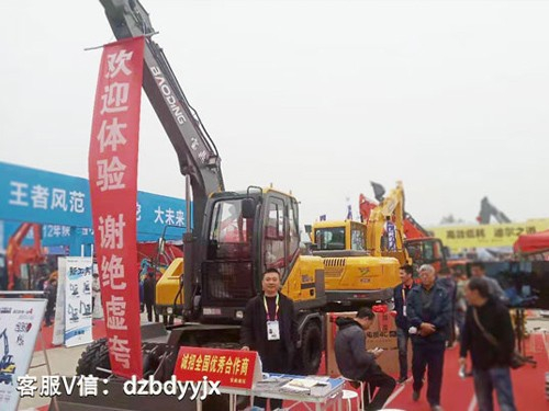 寶鼎多功能輪式挖掘機抓木機西北展會正在如火如荼的舉辦